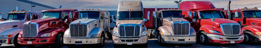 line of semi-truck cabs